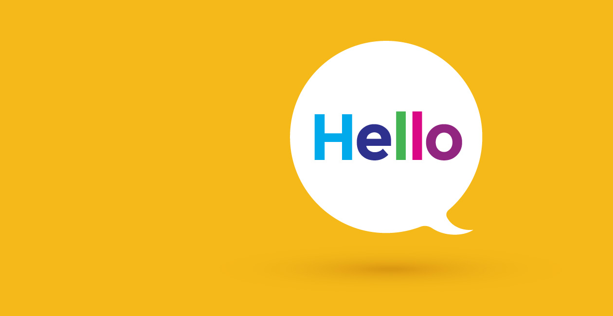 An illustration of a speech bubble in yellow with the word Hello written inside.